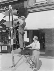 Traffic lights beings obscured for an Air Raid Precautions drill at Gravesend, Kent