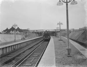 Platform Prints: A train stopped at the new Swanley train station. 1939