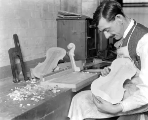 Worker Prints: Training Ex Service Men at the music trades Factory. Making a Violin. 22 May 1920