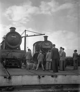 Trainspotters Club outing Young members of the trainspotters club gather around
