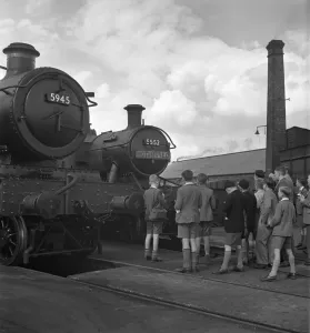 Trainspotters Club outing Young members of the trainspotters club gather around