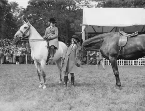 Girls Prints: Tring show, 1922. Miss Patricia ( dismounted ) and Miss Barbara Grant Morden