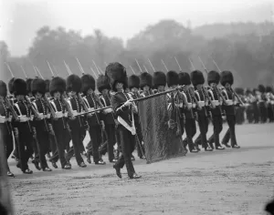 Trooping of the colour. The march past the King with the Colour. 3 June 1924
