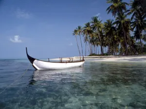 TROPICAL ISLANDS - Laccadives Bangaram island, with traditional boat. The Laccadive