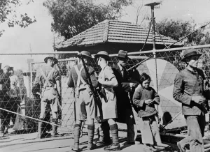 The Ulsters let them through. Chinese refugees, including a tearful little girl