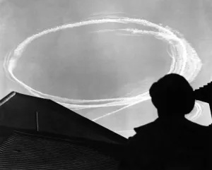 Wartime Prints: Vapour trails over Sidcup suggest a dogfight - aerial combat between fighter aircraft
