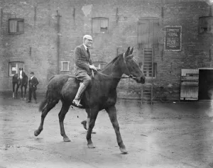 The Varsity Trial Eights. Mr Hartley, the famous Cambridge stroke, following