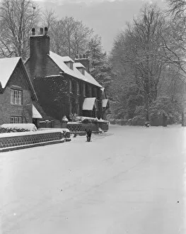 Fence Collection: The village of Chevening, Kent, in the snow. 1938