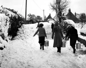 People Prints: Three volunteers taking milk to the Villager of Cudham, Kent, who were cut off by