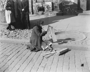 Warsaw, Poland. A woman wood chopper at Warsaw. 25 October 1921