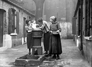 Child Collection: Water pump at Twine Court, London. 1933