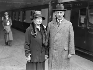 At Waterloo, Col and Mrs Stimson photographed prior to their departure for U. S. 28