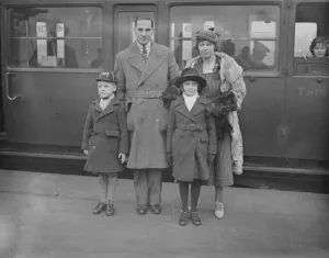 At Waterloo Herbert Sutcliffe with his wife and family on leaving for a Christmas cruise
