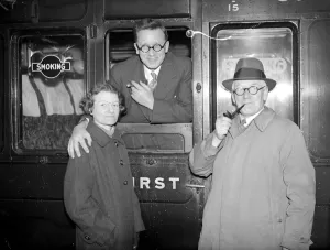 Glass Prints: At Waterloo. Mr Herbert Morrison on his departure for USA Mrs Morrison and Mr Harold Clay
