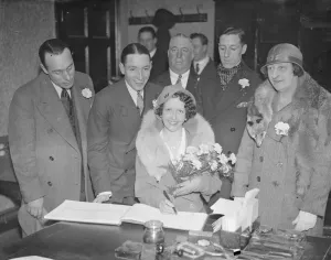 Wedding Dress Prints: Wedding of Charles Smirks and Mrs Girvan Barker at Epsom Register office Bride