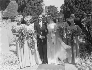 Church Prints: The wedding of Guy Farr and Miss Stacey in Crayford, Kent. The bridal group. 1939
