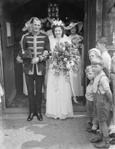 Groom Prints: The wedding of Mr Archie Percival Laurie Batsom RA and Miss Iris Ivy Gwen Kemp. The bride