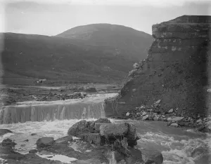 The Welsh disaster. The now wide open sluice gate relieving the pressure upon