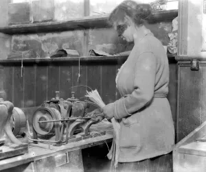 Whalebone cutting - A Leyton industry. Stripping by means of jigging machine. 1923