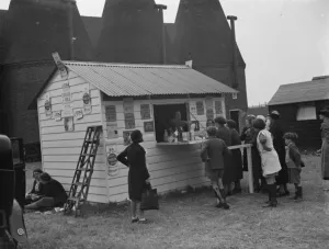 Whitbreads hop farm in Belting, Kent. People queuing up at the onsite milk bar