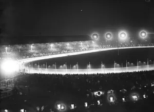The White City at night, where illuminated greyhound racing attracts average crowd of 75, 000