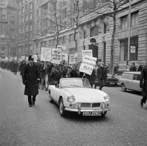 White and coloured students, displaying slogan carrying placards pictured during