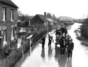 Rescue Prints: Widespread havoc caused by floods after heavy rain as the level of the River Medway burst its banks