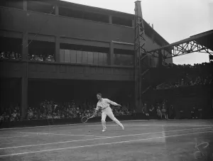 Wimbledon lawn tennis championships. W F Coen in play against H W Austin on the centre court