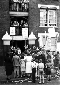 Wives as pickets in East End no rent strike. What is stated to be the largest