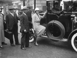 Woman channel swimmer arrives in London. Mrs C Corson and her husband after their