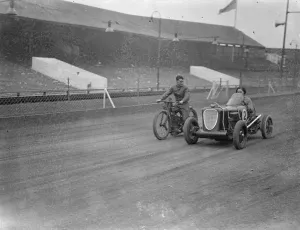 Woman driver takes up midget car racing. Fay Taylor, well known racing driver