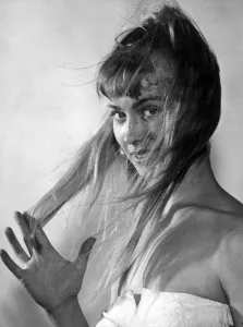 Fashionista Prints: A woman with long hair looking at the camera 1960s