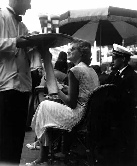 Girl Collection: Woman on terrace of cafe in Paris 1950s