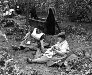 Picking Prints: Two women Hop Pickers stopping for lunch