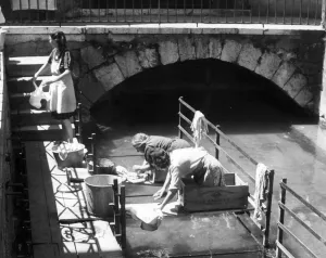 Bridge Prints: Women washing clothes in Switerland using traditional methods with scrubbing brushes