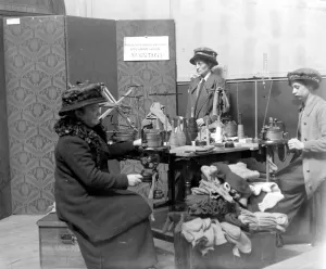 War Work Prints: The Womens Emergency Corps. Women making knitted garments. 1914 - 1918
