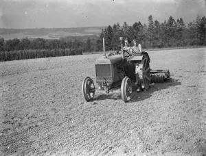 Womens Land Army in training on the fields of Wye, Kent. Here Land Girls are