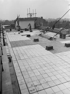 Workers from Val De Travers Asphalt Limited, a paving company, working on paving
