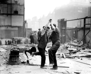 Celebration Prints: Workmen dance to the newfangled gramophone - 1923 dance / dancing / party season