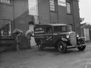 Workmen loading up a delivery van from Platt Mill, Borough Green, with sacks of flour