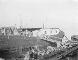 The wrecked ruin of the ship Mockingbird on the side of the river Thames at Gravesend