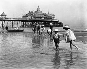 Girls Collection: Young children having holiday fun in the sea at Eastbourne. 9 August 1916