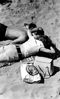 Romance Collection: Young couple on the beach 1960s love couple romance romantic for valentines